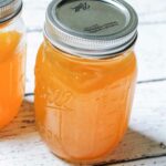 A canning jar of corn cob jelly