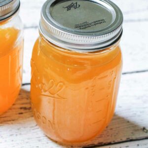 A canning jar of corn cob jelly