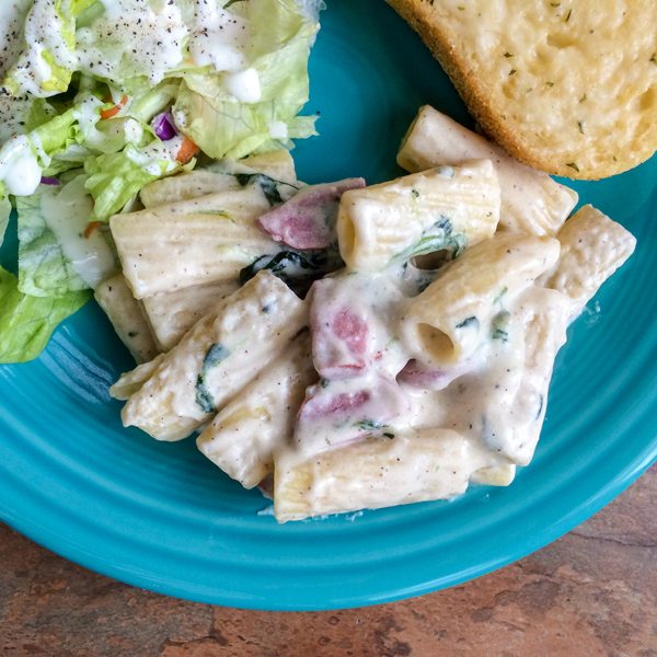 Creamy Baked Rigatoni with Bechamel Sauce and Garlic Sauteed Spinach