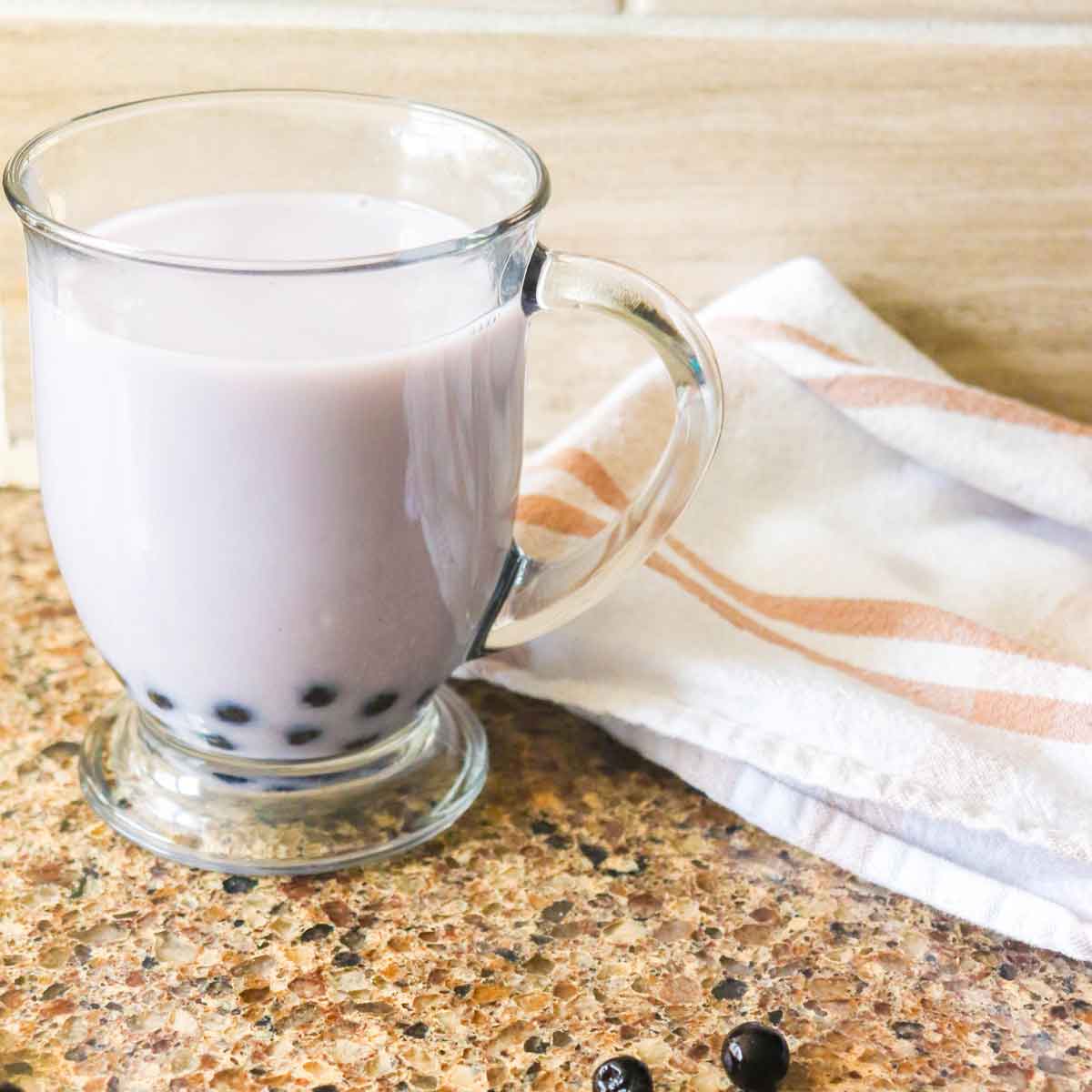 Blueberry Bubble Tea with Boba on a Countertop