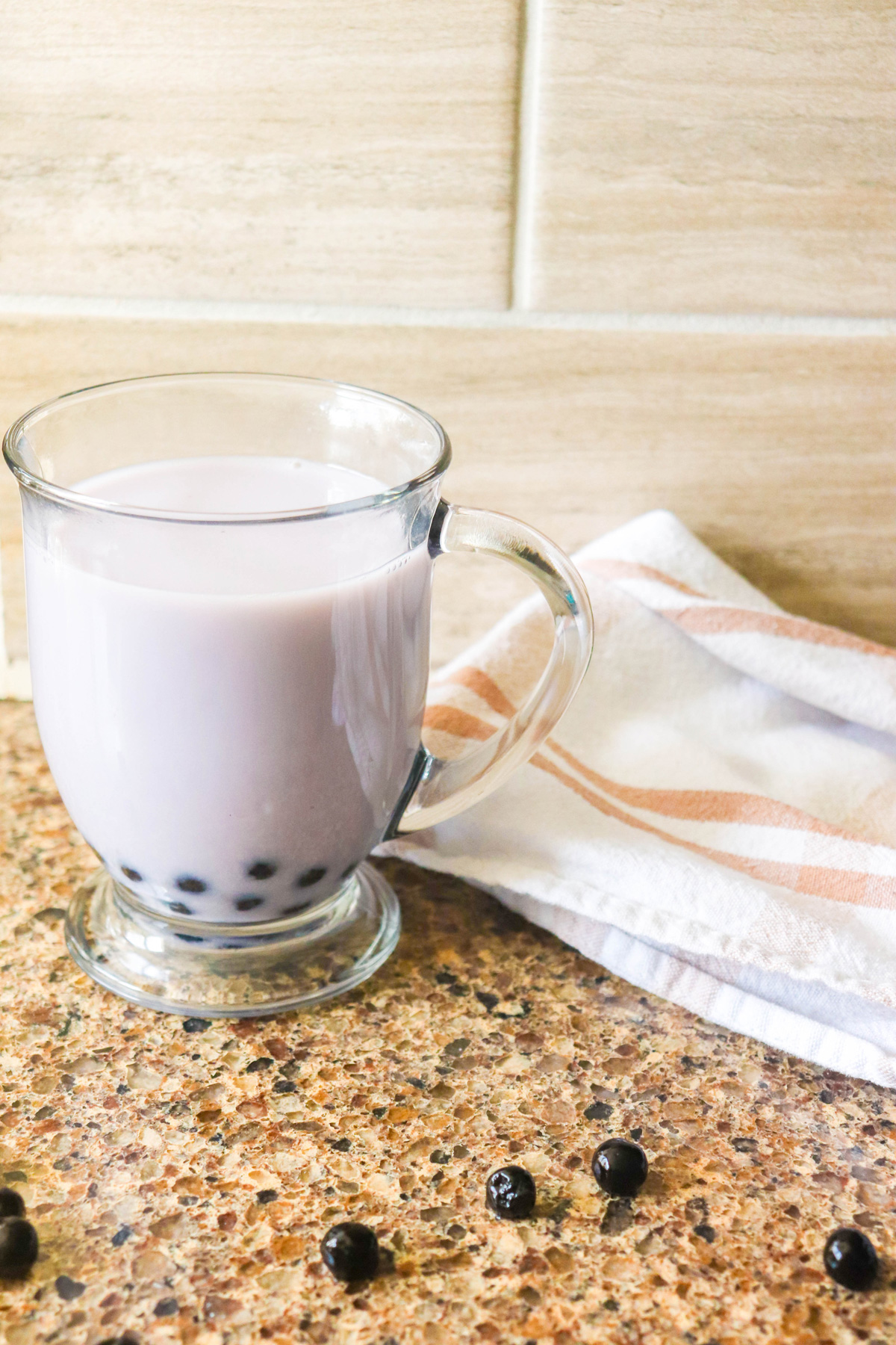 Blueberry Bubble Tea with Tapioca Pearls on a Countertop