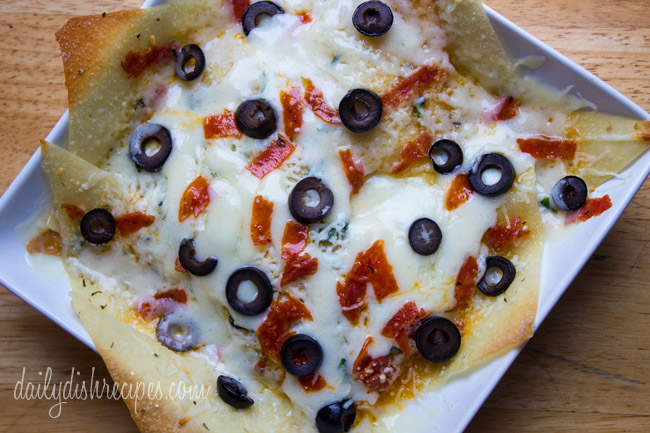 Italian Nachos with Pepperoni and Black Olives from A TASTE OF HOME: ST. LOUIS FAVORITES #WUHomeCooked #Paid Italian Nachos with Pepperoni and Black Olives from A TASTE OF HOME: ST. LOUIS FAVORITES #WUHomeCooked #Paid