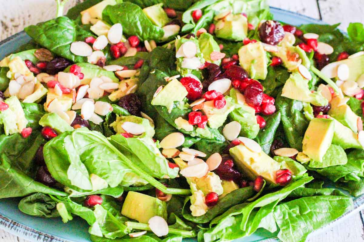 overhead shot of Avocado Pomegranate Spinach Salad